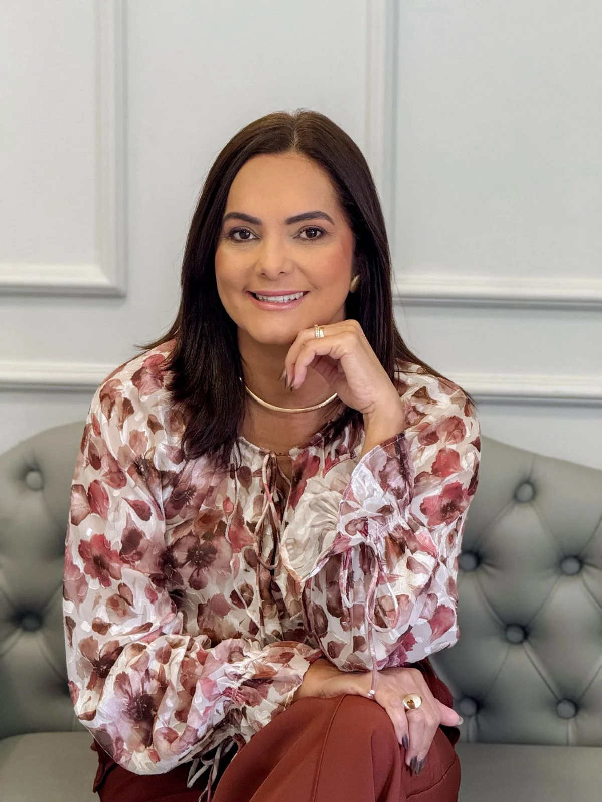 Foto de Cleide Ferreira, uma mulher sorrindo